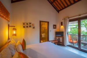 Voodi või voodid majutusasutuse Hoi An Chic - Green Retreat toas