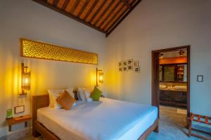 Voodi või voodid majutusasutuse Hoi An Chic - Green Retreat toas