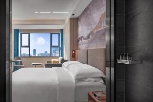 Aurea Central Hotel客房内的一张或多张床位
