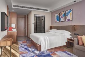 Aurea Central Hotel客房内的一张或多张床位