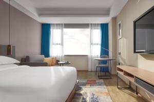 Aurea Central Hotel客房内的一张或多张床位