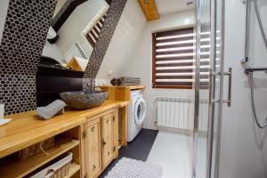 Kuchyňa alebo kuchynka v ubytovaní Apartamenty na Galicówce