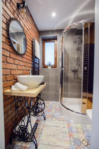 A bathroom at Apartamenty na Galicówce
