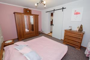 Posteľ alebo postele v izbe v ubytovaní Apartamenty na Galicówce