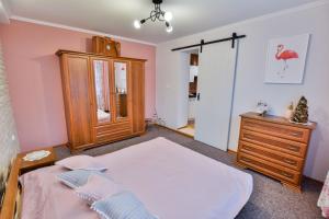 Posteľ alebo postele v izbe v ubytovaní Apartamenty na Galicówce