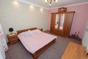 Posteľ alebo postele v izbe v ubytovaní Apartamenty na Galicówce