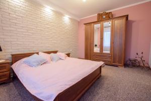 Posteľ alebo postele v izbe v ubytovaní Apartamenty na Galicówce