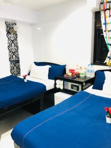 Postel nebo postele na pokoji v ubytování Australia Lounge