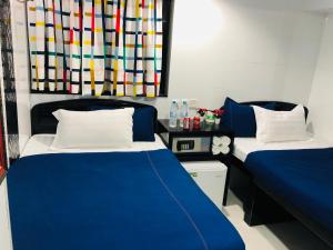 Postel nebo postele na pokoji v ubytování Australia Lounge