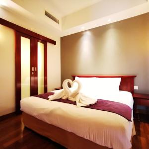 【Amazing】Pool View 2BR Suite @ Pulai Springs Resort客房内的一张或多张床位