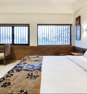 Posteľ alebo postele v izbe v ubytovaní Hotel Regency