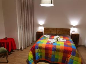 Postel nebo postele na pokoji v ubytování B&B Belli Dentro