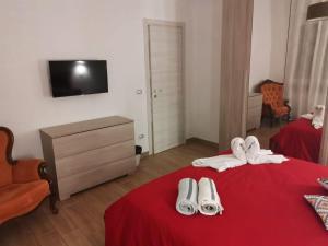 TV a/nebo společenská místnost v ubytování B&B Belli Dentro