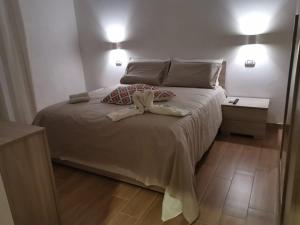 Postel nebo postele na pokoji v ubytování B&B Belli Dentro