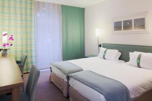 Postel nebo postele na pokoji v ubytování Holiday Inn Resort le Touquet by IHG