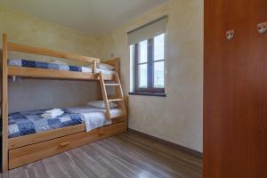 Posteľ alebo postele v izbe v ubytovaní Teo Apartments