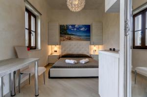 Posteľ alebo postele v izbe v ubytovaní Teo Apartments + 35 fotografií