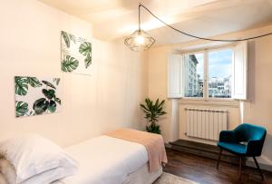Posteľ alebo postele v izbe v ubytovaní Historic Center apartment - Next to the river, all attractions - By LikeHomeFlorence