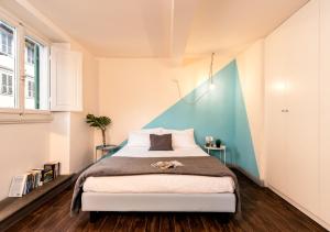 Posteľ alebo postele v izbe v ubytovaní Historic Center apartment - Next to the river, all attractions - By LikeHomeFlorence