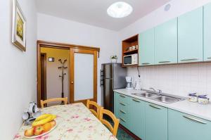 Kuchyň nebo kuchyňský kout v ubytování Antares Apartments