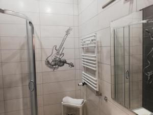 Kúpeľňa v ubytovaní Apartamenty przy Gimnazjalnej