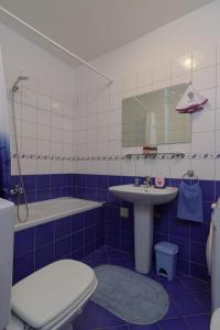 Koupelna v ubytování Apartment Marijana + 28 fotografií