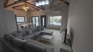 A seating area at VILLA ANTHIMOS