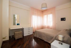 Llit o llits en una habitació de Appartamento Cadore