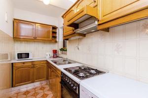 Kuchyň nebo kuchyňský kout v ubytování Antares Apartments