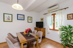 TV a/nebo společenská místnost v ubytování Antares Apartments
