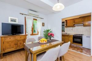 Kuchyň nebo kuchyňský kout v ubytování Antares Apartments