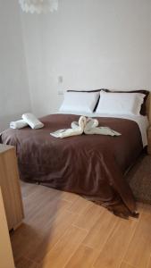 Postel nebo postele na pokoji v ubytování B&B Belli Dentro