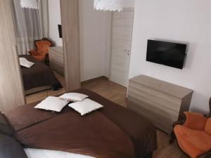Postel nebo postele na pokoji v ubytování B&B Belli Dentro