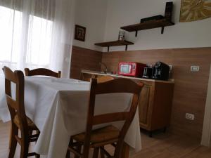 Kuchyň nebo kuchyňský kout v ubytování B&B Belli Dentro