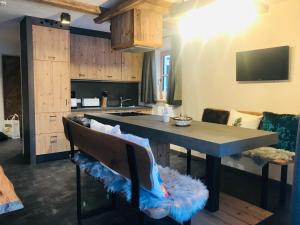 Köök või kööginurk majutusasutuses Sieglhub Chalets - Appartements - Hotel