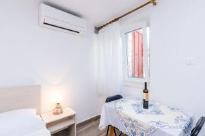 Ein Bett oder Betten in einem Zimmer der Unterkunft Guesthouse Matusic