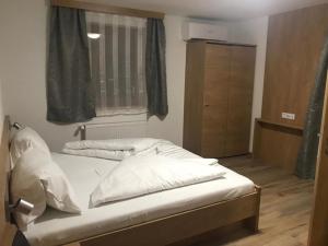 Letto o letti in una camera di Appartements Hirner