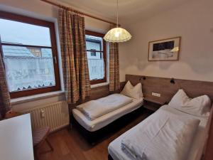 Säng eller sängar i ett rum på appartementen Haus Bergblick
