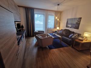 A television and/or entertainment centre at appartementen Haus Bergblick