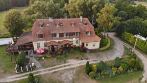 Zahrada ubytování Folwark Łuknajno nad Jeziorem Śniardwy Gospoda Dziedzictwo Kulinarne Warmia-Mazury