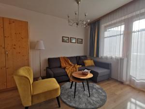 A seating area at appartementen Haus Bergblick