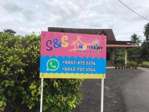a sign for a disney malaysia restaurant at OPRO S&S Homestay Pagoh Malay Only in Muar