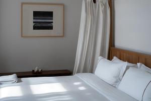 Postel nebo postele na pokoji v ubytování Huanghsan SU House