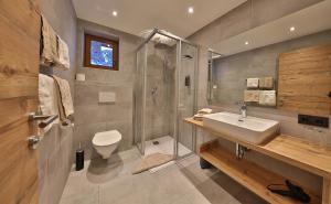 Koupelna v ubytování Hotel Garni Fiegl Apart