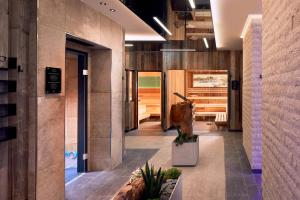 a lobby of a building with a sauna at Hotel Neue Post in Mayrhofen