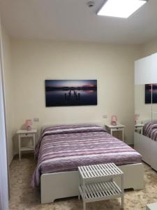 Postel nebo postele na pokoji v ubytování B&b Il Bacio