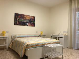 Postel nebo postele na pokoji v ubytování B&b Il Bacio
