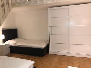 Postel nebo postele na pokoji v ubytování Welcome Hostel & Apartments Praguecentre