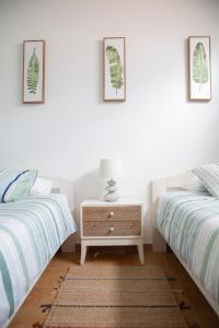 A bed or beds in a room at Arena Blanca