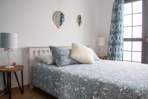 A bed or beds in a room at Arena Blanca
